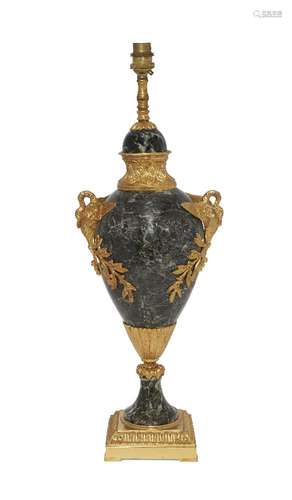 A gilt metal mounted serpentine table lamp, in the Louis XVI style, 20th century, with two swan form