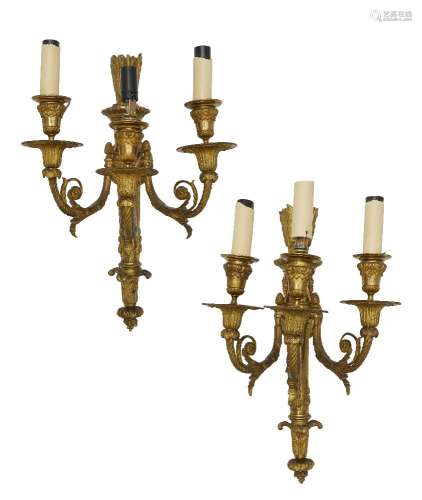 A pair of French three branch wall lights, in the Louis XVI taste, 19th century, the backplates
