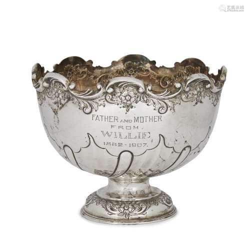 A silver presentation bowl, Sheffield, c.1905, Levesley Brothers, the half-lobed twist repousse bowl