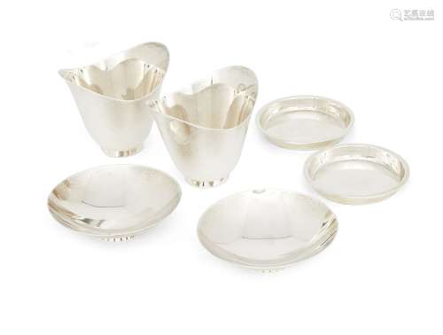 Two Tiffany & Co. finger bowls, the plain dipped body raised upon a circular foot, 7cm high,