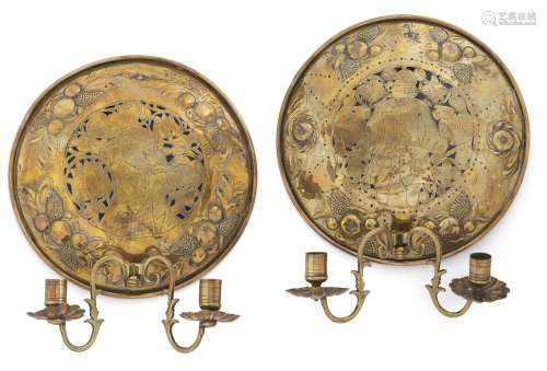 A pair of Dutch taste circular brass pierced wall lights, late 19th/early 20th century, pierced