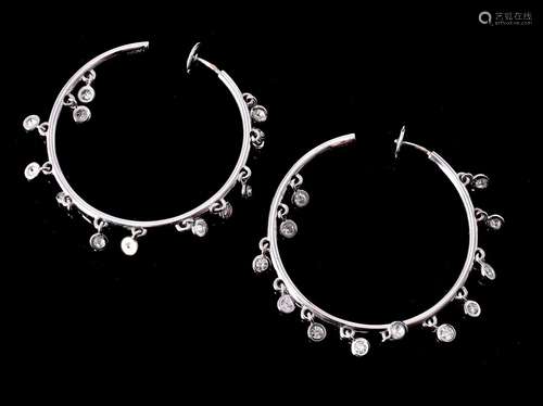 A pair of diamond hoop ear pendants by Elie Chatila