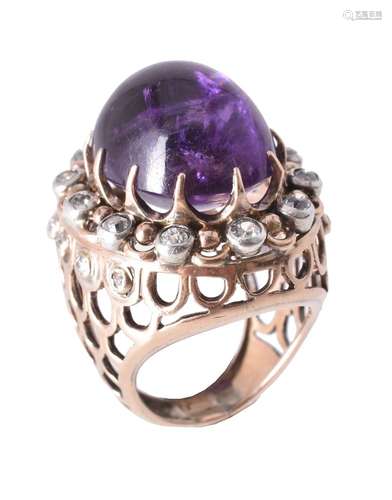 An amethyst and diamond dress ring