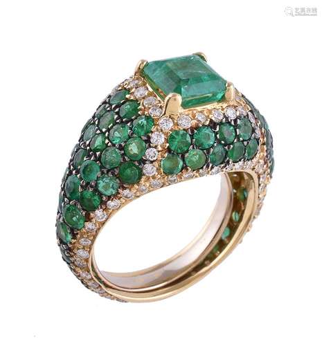 An emerald and diamond ring