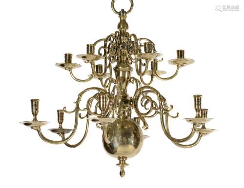 A companion pair of Dutch or English brass twelve light chandeliers, 18th century
