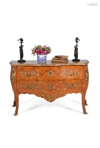 A Louis XV tulipwood and floral marquetry serpentine commode, circa 1760