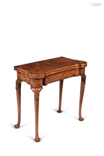 A George II walnut and feather banded card table, circa 1730
