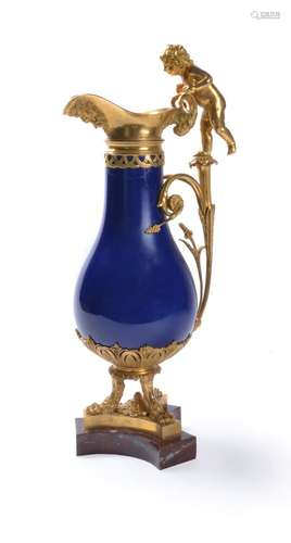 A Louis XVI blue ground Paris porcelain and ormolu and marble mounted ewer, circa 1785