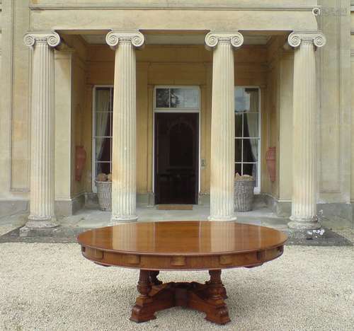 A rare Victorian oak concentric extending dining table, , circa 1860