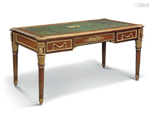 A French mahogany and ormolu mounted bureau plat, in Louis XVI style, late 19th/ early 20th century