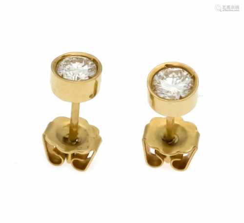 Brilliant stud earrings GG 750/000, each with one brilliant, total 0.64 ct W / VS,