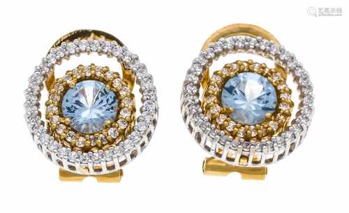 Blue topaz brilliant clip ear studs GG / WG 750/000, each with a round faceted blue topaz