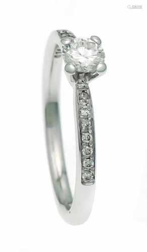 Brilliant ring WG 585/000 with a brilliant 0.31 ct (slightly cracked) and 8 brilliants, in