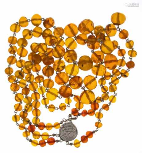 Amber necklace with metal buckle D. 21 mm, amber balls 18 x 9 mm, 3 rows, L. 50 - 61 cm,