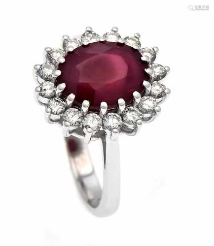 Ruby-Brillant-Ring WG 585/000 with an oval fac. Ruby 3.90 ct in good color and diamonds,