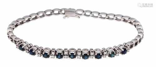 Sapphire diamond bracelet WG 750/000 with 9 round fac. Sapphires 3.5 mm and 20 diamonds,