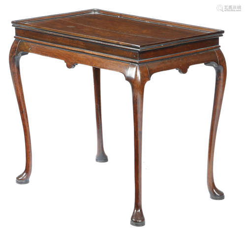 A MAHOGANY SILVER TABLE IN GEORGE II STYLE LATE 19TH CENTURY the galleried top above a plain frieze,