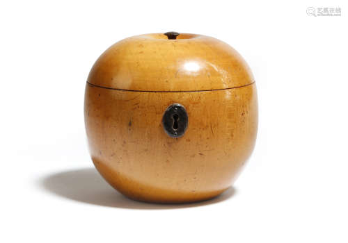 A TREEN FRUITWOOD TEA CADDY IN THE FORM OF AN APPLE LATE 18TH / EARLY 19TH CENTURY the interior with