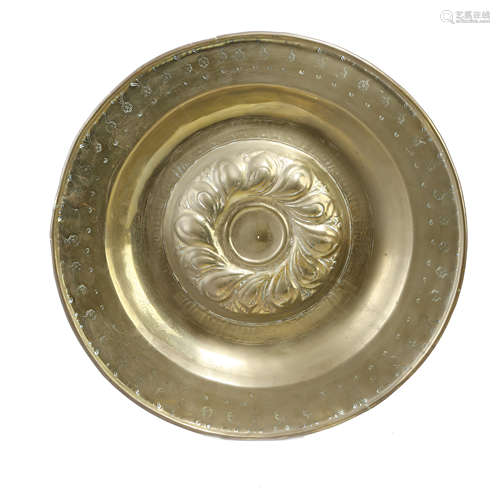 A GERMAN BRASS ALMS DISH PROBABLY NUREMBERG, MID-16TH CENTURY with punched decoration, the centre