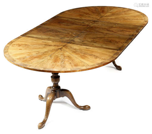 A WALNUT TWIN PEDESTAL DINING TABLE IN 18TH CENTURY STYLE EARLY 20TH CENTURY the cross and feather