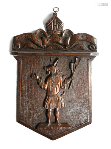 A CARVED OAK HERALDIC WALL BRACKET COMMEMORATING FIVE HUNDRED YEARS OF WINCHESTER COLLEGE LATE