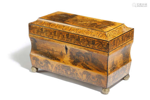 A 19TH CENTURY PENWORK STYLE TEA CHEST of sarcophagus shape, all over decorated with printed