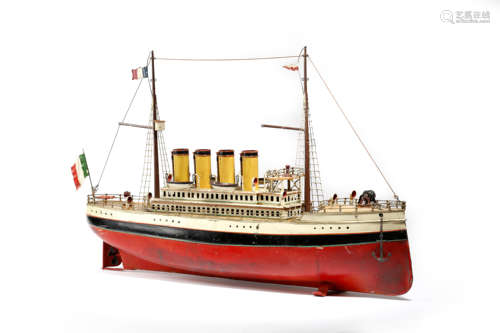 A GERMAN TINPLATE CLOCKWORK MODEL OF AN OCEAN LINER BY CARETTE c.1912-14 with a red and black