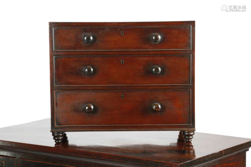 A 19TH CENTURY MAHOGANY CHILD'S CHEST C.1840 of three long drawers, on inverted beehive feet 51.