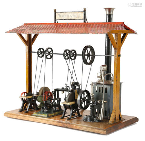 A GERMAN TINPLATE STEAM DRIVEN WORKSHOP BY ERNST PLANK c.1910-12 with an overhead drive powering a