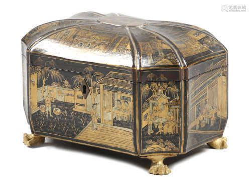 A CHINESE BLACK LACQUER TEA CHEST LATE 19TH CENTURY of fluted shape, decorated in gilt with panels