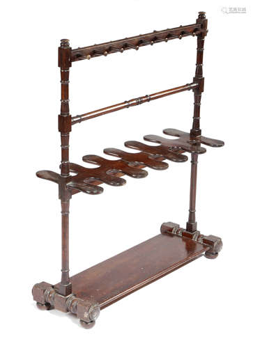 A 19TH CENTURY MAHOGANY WHIP AND BOOT STAND c.1840 with turned spindle supports 95.4cm high, 75cm