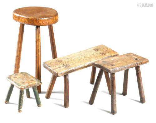 FOUR PRIMITIVE DAIRY STOOLS 19TH CENTURY AND LATER of ash and elm, with traces of original painted
