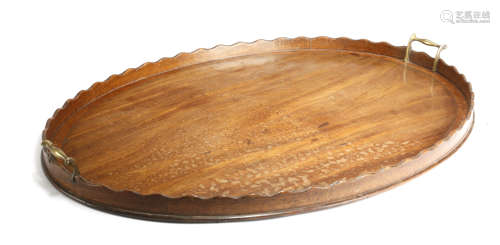 A GEORGE III MAHOGANY OVAL TRAY LATE 18TH CENTURY crossbanded and inlaid with chequer stringing,