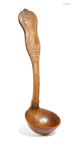 A CARVED TREEN FRUITWOOD LADLE 19TH CENTURY of king's pattern, pierced for suspension 29.5cm long