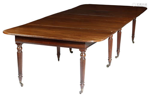 A GEORGE IV MAHOGANY EXTENDING DINING TABLE EARLY 19TH CENTURY AND LATER the reeded edge top with