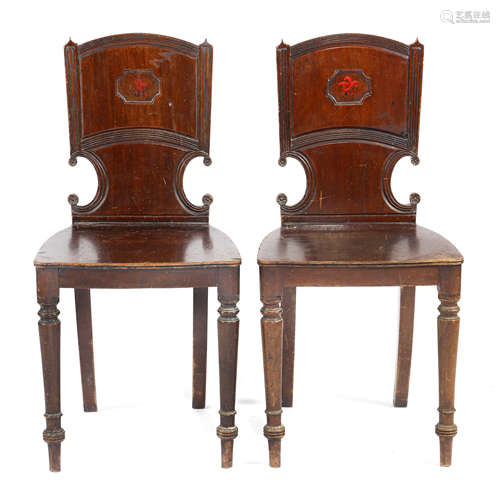 A PAIR OF REGENCY MAHOGANY HALL CHAIRS EARLY 19TH CENTURY each with a gorget back later painted with