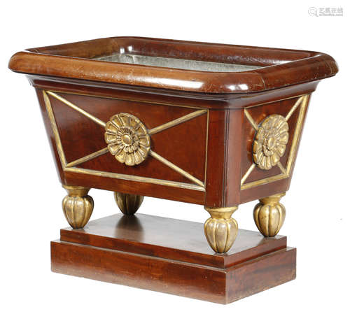 A REGENCY MAHOGANY WINE COOLER EARLY 19TH CENTURY with parcel gilt decoration, the roll-over rim