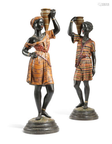 A PAIR OF COLD PAINTED SPELTER CANDLESTICKS IN THE FORM OF BLACKAMOORS LATE 19TH / EARLY 20TH