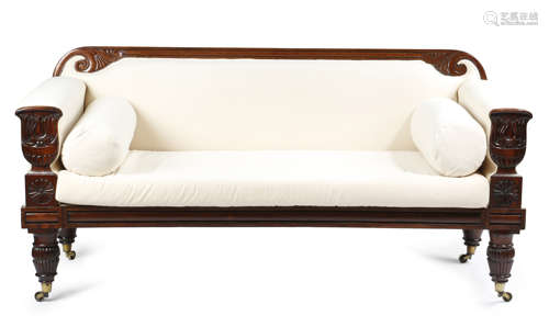 λ A GEORGE IV ROSEWOOD SOFA IN THE MANNER OF GILLOWS EARLY 19TH CENTURY the frame carved with urns,