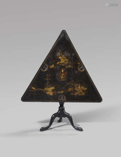 A RARE GEORGE I JAPANNED TRIANGULAR GAMES TABLE c.1720 the Chinese black lacquer tilt-top gilt