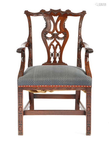 A MAHOGANY OPEN ARMCHAIR IN CHIPPENDALE STYLE 19TH CENTURY the pierced splat back carved with