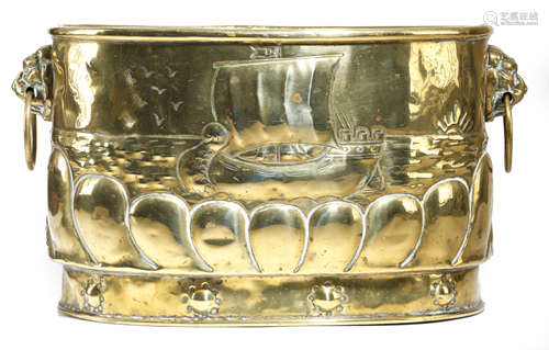 A DUTCH BRASS OVAL JARDINIERE LATE 19TH CENTURY repousse decorated with sailing ships and with