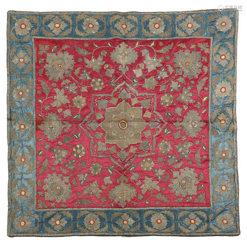 A COVER OF RED SATIN PERSIAN, c.1800 embroidered in silk and silver metal thread with a central