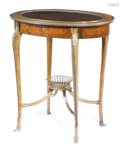 A FRENCH KINGWOOD AND BEECHWOOD OVAL BIJOUTERIE TABLE IN LOUIS XVI STYLE LATE 19TH CENTURY with gilt