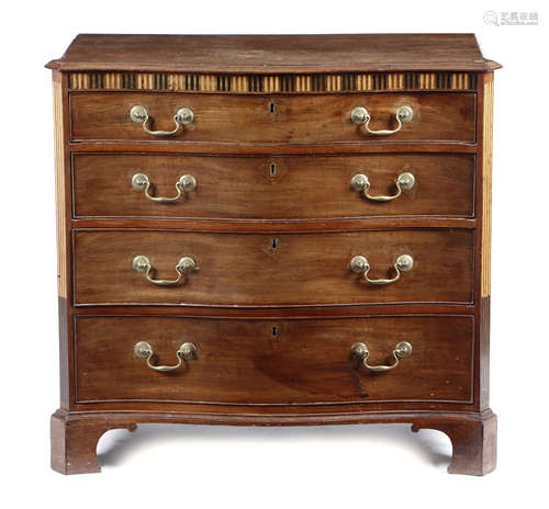 A GEORGE III MAHOGANY SERPENTINE CHEST LATE 18TH CENTURY inlaid with boxwood and ebonised faux