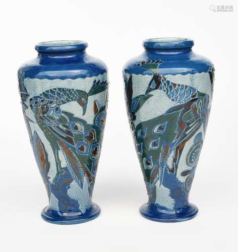 A pair of Charles Brannam Barum vases, dated 1930, shouldered, flaring cylindrical form, incised and