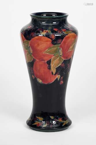 'Pomegranate' a tall Moorcroft Pottery baluster vase designed by William Moorcroft, shouldered form,