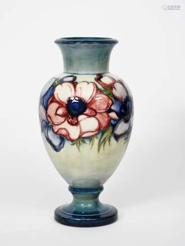 'Anemone' a Moorcroft Pottery baluster vase designed by William Moorcroft, painted in shades of