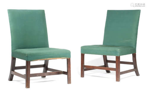 TWO SIMILAR GEORGE III MAHOGANY SIDE CHAIRS c.1770 each with a padded back and seat, on moulded