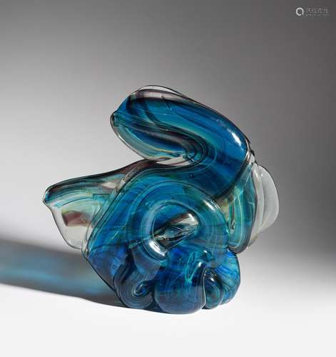 A Mdina Glass Knot sculpture by Michael Harris, dated 1974, swirling blue and purple glass with